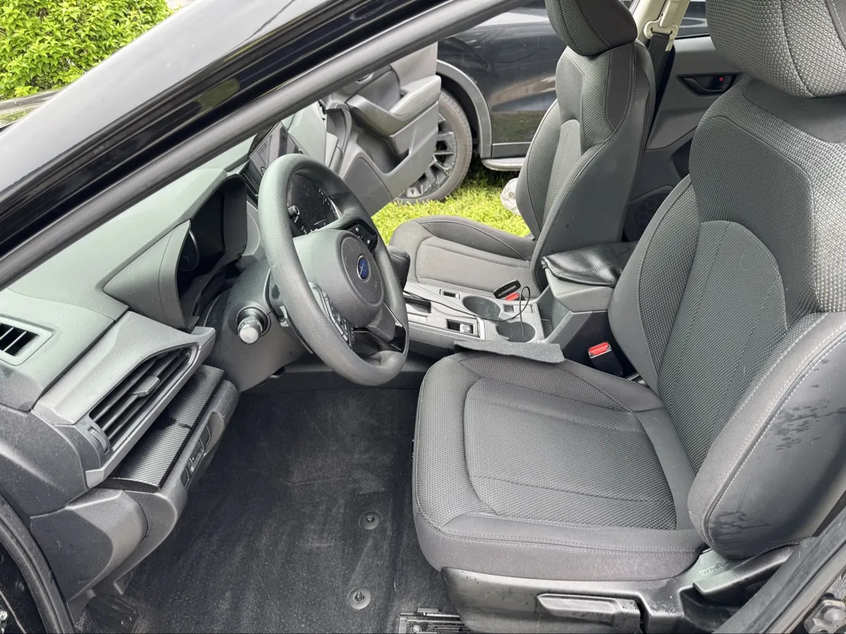 Finished Subaru Crosstrek front interior after a Premium Interior Detail — clean seats, dash and console