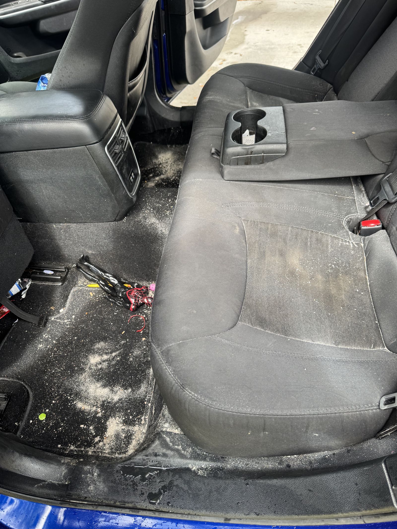 Charger back seat before detail, debris and stains