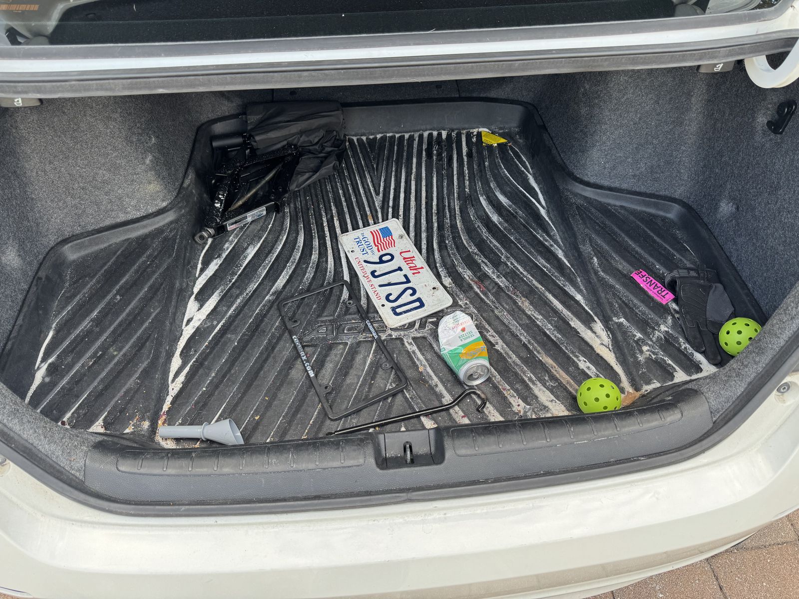 Accord trunk before detail, cluttered and dusty