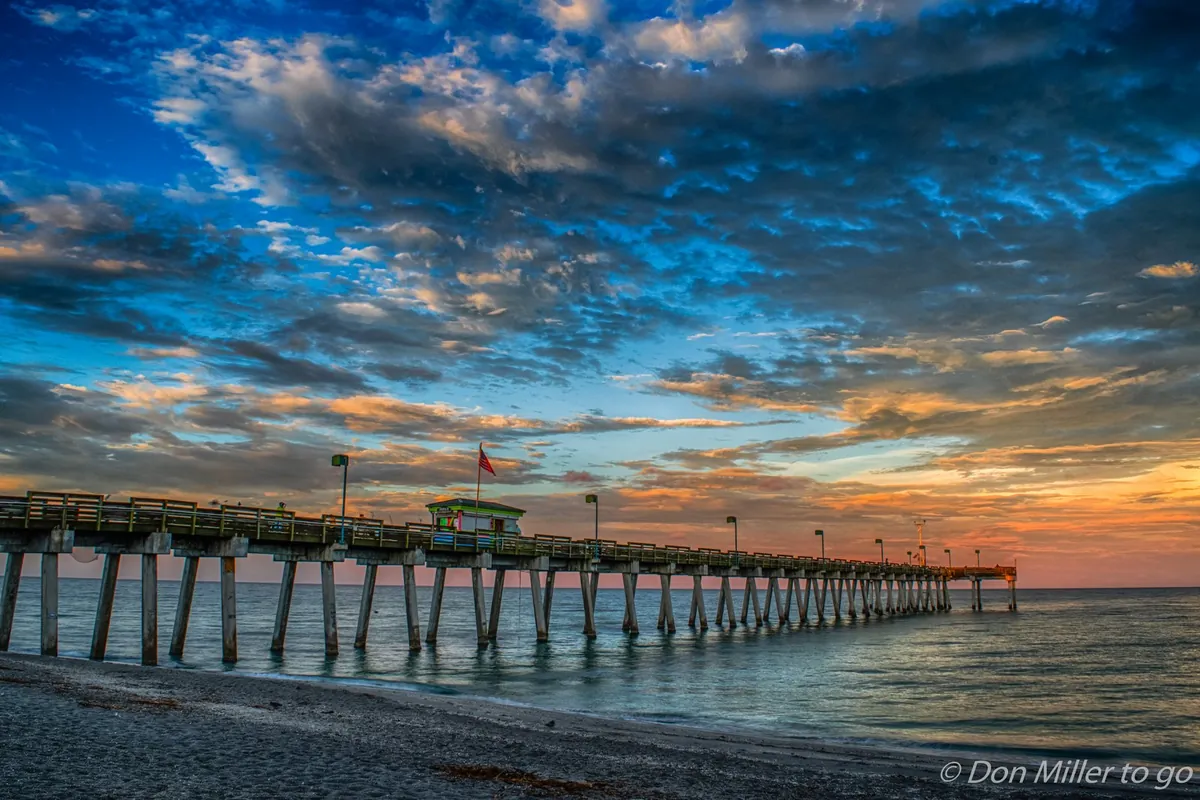 Venice Fishing Pier (Sharky's Pier) at sunrise over the Gulf of Mexico